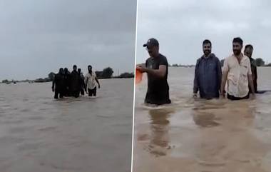 Gujarat Flood: বৃষ্টিতে বানভাসী গুজরাট, জলের তলায় একাধিক গ্রাম, বন্যা দুর্গতদের সেবায় এগিয়ে এলেন গ্রামবাসীরাই, দেখুন ভিডিয়ো