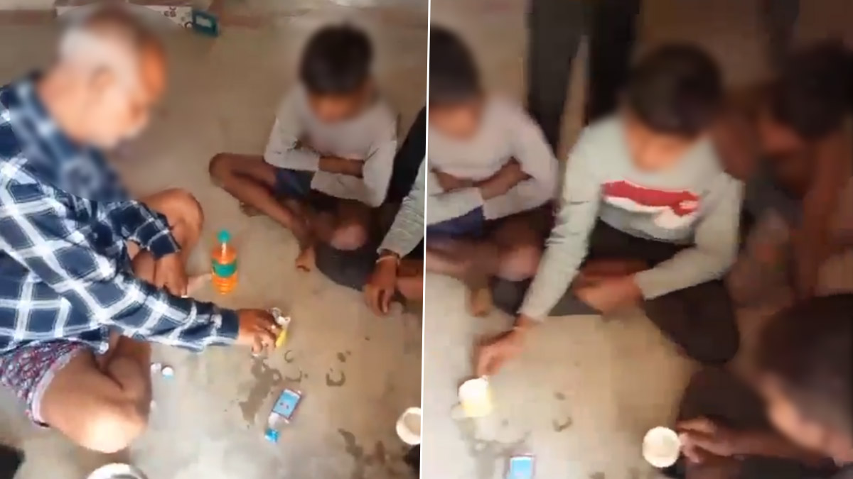 Teacher Serving Alcohol to Students: পড়াশোনা চুলোয় যাক, স্কুলে বসে খুদে পড়ুয়াদের মদ খাওয়ানোর অভিযোগ শিক্ষকের বিরুদ্ধে, দেখুন ভিডিয়ো