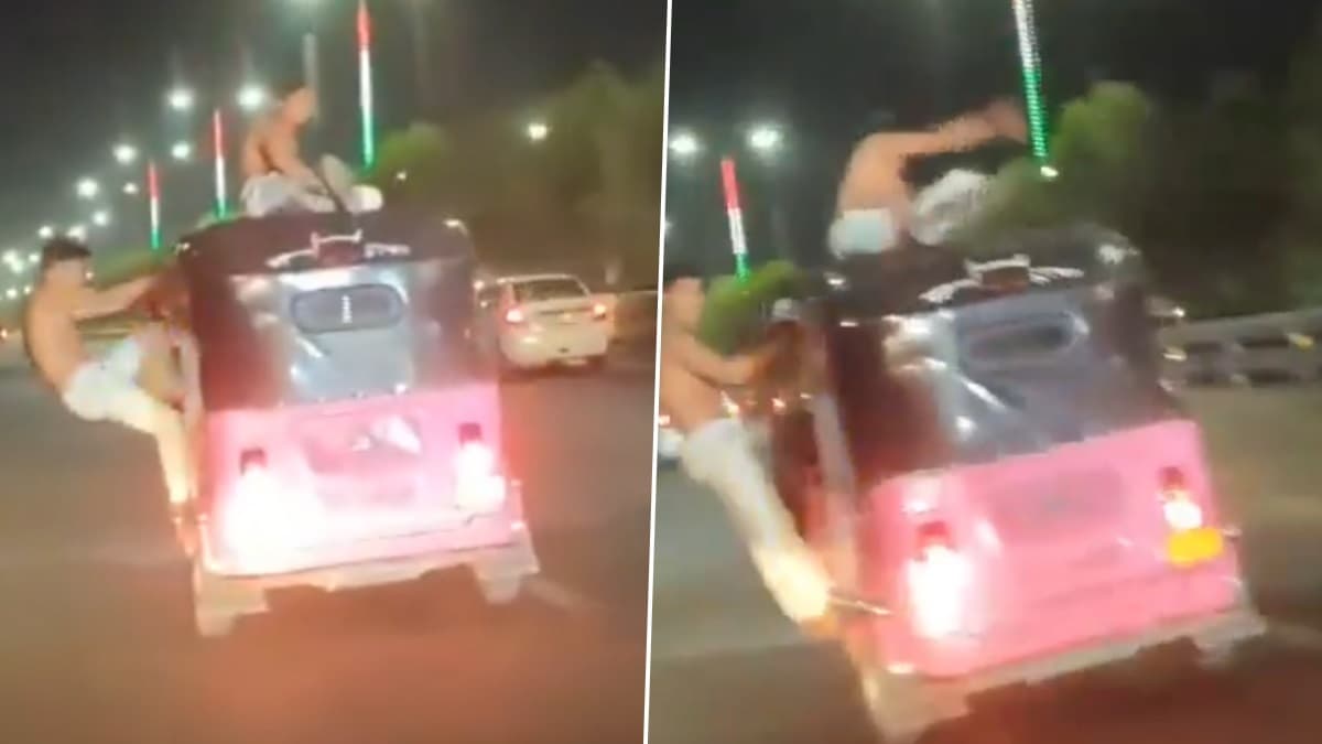 Viral Video Of Stunt: অটো থেকে ঝুলছেন খালি গায়ে, অন্যজনের হুমড়ি ছাদে, রাতের রাস্তায় ২ যুবকের কায়দাবাজি ঘিরে উত্তাল সোশ্যাল মিডিয়া