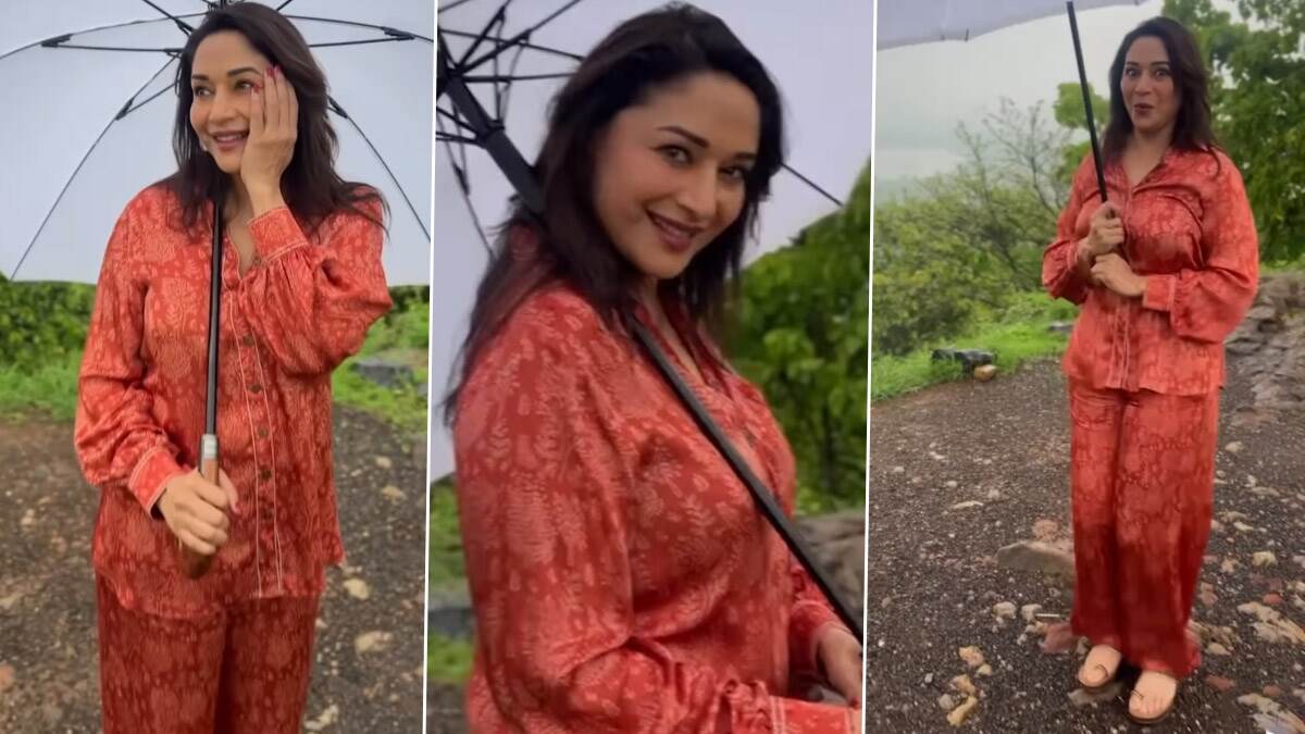 Madhuri Dixit Dances in Rain: জল থৈথৈ করছে মুম্বই, ছাতা মাথায় বৃষ্টি উপভোগ অভিনেত্রী মাধুরী দীক্ষিতের, দেখুন