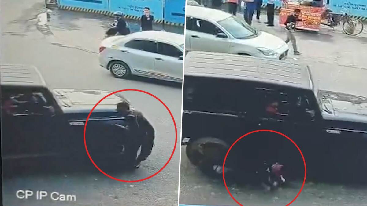 Security Guard Run Over by Mahindra Thar: অবাঞ্ছিত হর্ন বাজাতে নিষেধ করায় নিরাপত্তারক্ষী পিষে দেওয়ার চেষ্টা থার চালকের, দেখুন ঘটনার সিসিটিভি ফুটেজ