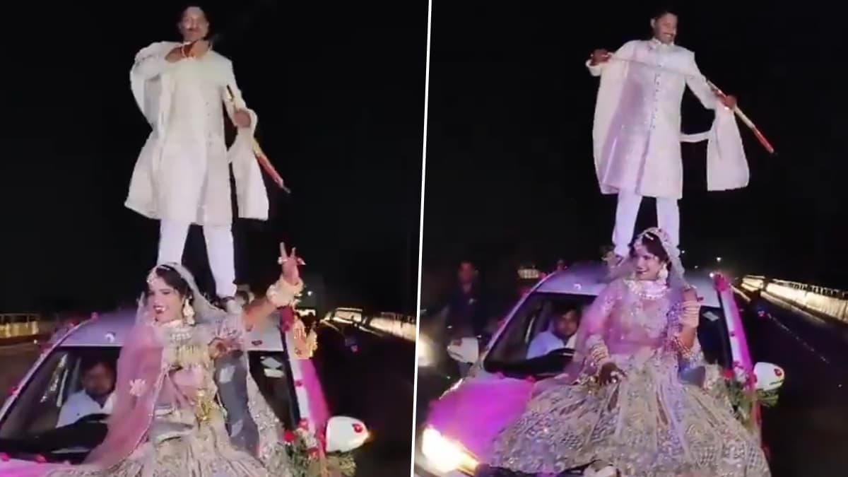 Viral Wedding Video: গাড়ির ছাদে উঠে তরোয়াল ঘোরাচ্ছেন বর, বনেটে বসে নাচছেন কনে, ভিডিয়ো ভাইরাল হতেই শ্রীঘরে নবদম্পতি