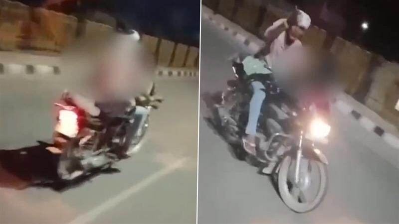 Romance On Speeding Bike: হাইওয়েতে প্রেমে হাবুডুবু খাচ্ছেন যুগল, বাইকের তেলের ট্যাঙ্কির উপর শুয়ে তরুণী, হেলমেট ছাড়াই ছোটাচ্ছেন প্রেমিক, ভিডিও ভাইরাল
