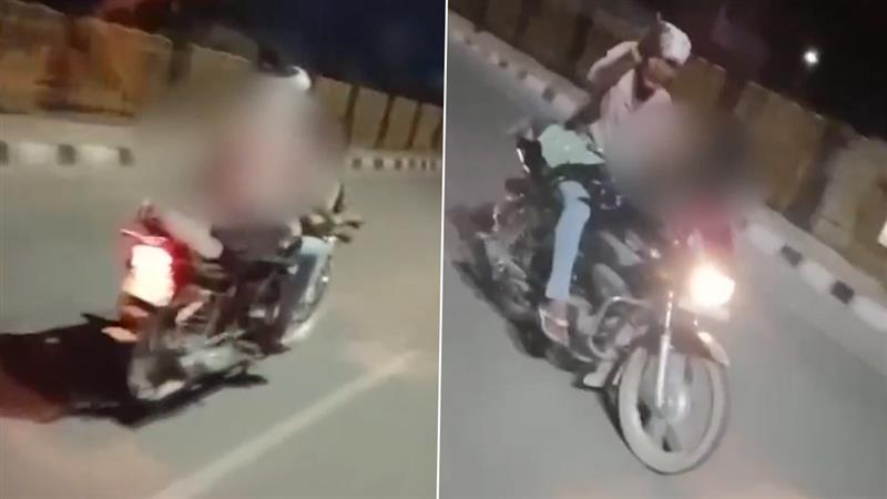 Romance On Speeding Bike: হাইওয়েতে প্রেমে হাবুডুবু খাচ্ছেন যুগল, বাইকের তেলের ট্যাঙ্কির উপর শুয়ে তরুণী, হেলমেট ছাড়াই ছোটাচ্ছেন প্রেমিক, ভিডিও ভাইরাল