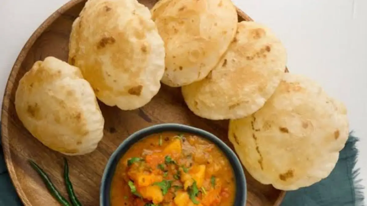 Potato Puri Recipe: আলু পুরি খেয়েছেন কখনো? একবার খেয়েই দেখুন অপূর্ব স্বাদ! দেখে নিন কিভাবে বানাবেন