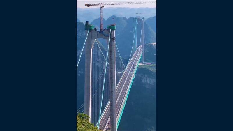 China The Huajiang Bridge: মাটি থেকে ২ হাজার ফুট উঁচুতে বিশ্বের উচ্চতম ব্রিজ উদ্বোধনের পথে চিন, জানুন হুয়াজিয়াং ক্যানিয়ন ব্রিজের কথা