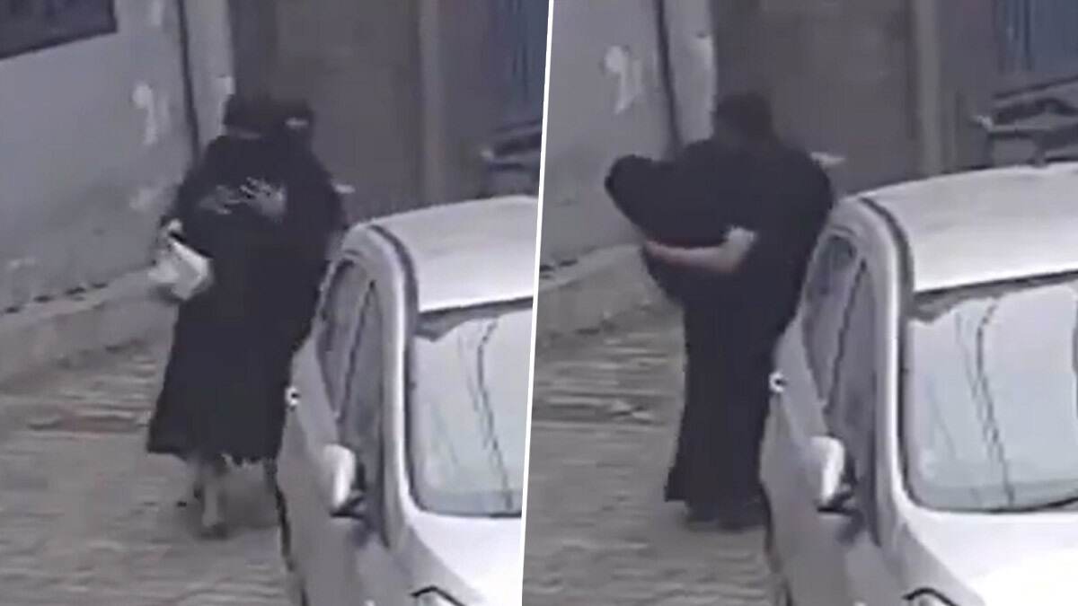 Horrific Video: প্রকাশ্য রাস্তায় বোরখা পরা মহিলাকে জড়িয়ে ধরে, বুক চেপে ধরল যুবক, চরম অসভ্যতামির ভিডিয়ো ভাইরাল
