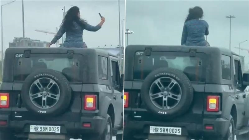 Viral Video: এই রিলই শেষ করবে সমাজকে? জাতীয় সড়কে গাড়ির মাথায় উঠে ভিডিয়ো মহিলার, দেখুন দুঃসাহসিক কাণ্ড