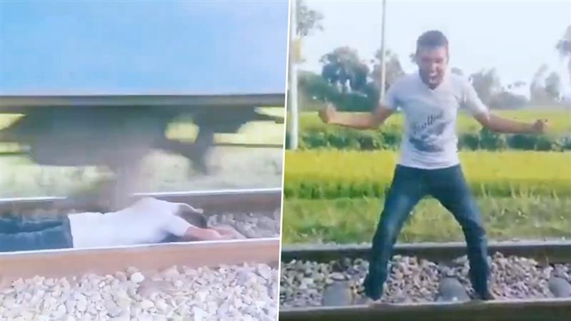 Viral Video: সোশ্যাল মিডিয়া 'মাথা খাচ্ছে' মানুষের, রিলের জন্য রেললাইনের মাঝে শুয়ে পড়েলেন এই যুবক, তারপর কী হল দেখুন