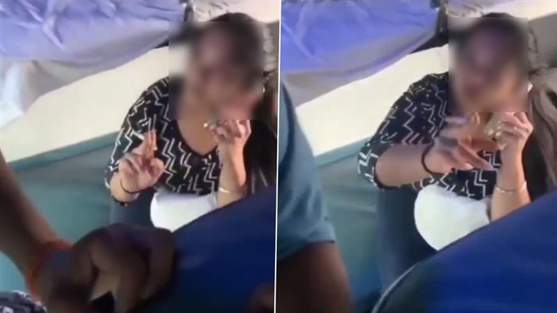 Viral Video: 'আপনার পয়সায় সিগারেট টানছি নাকি?' চলন্ত ট্রেনের এসি কোচে বিড়ি উঁচিয়ে হুমকি তরুণীর