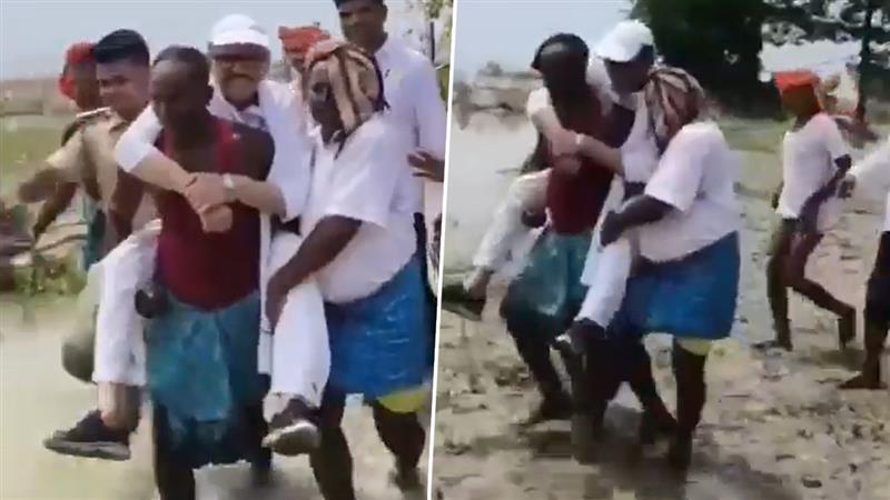 MP Tariq Anwar Viral Video: স্থানীয়দের কাঁধে চেপে বন্যাবিধ্বস্ত এলাকা ঘুরে দেখলেন কংগ্রেস সাংসদ, ভাইরাল ভিডিয়ো ঘিরে উত্তাল নেটপাড়া