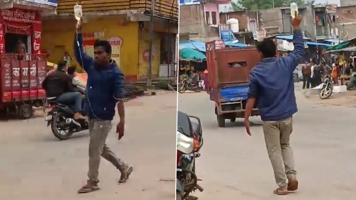 Viral Video: হাতে ব্যান্ডেজ, স্যালাইনের বোতল বাধিয়ে নিয়ে হাসপাতাল থেকে বেরিয়ে পড়ল রোগী, ভাইরাল ভিডিয়ো