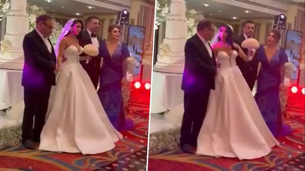 Iran: হিজাব-পন্থী নেতার মেয়ের বিয়ের এ কী সাজ! খোলামেলা গাউনের সঙ্গে খোলা মাথা, ভিডিয়ো ঘিরে উত্তাল ইরান, দেখুন