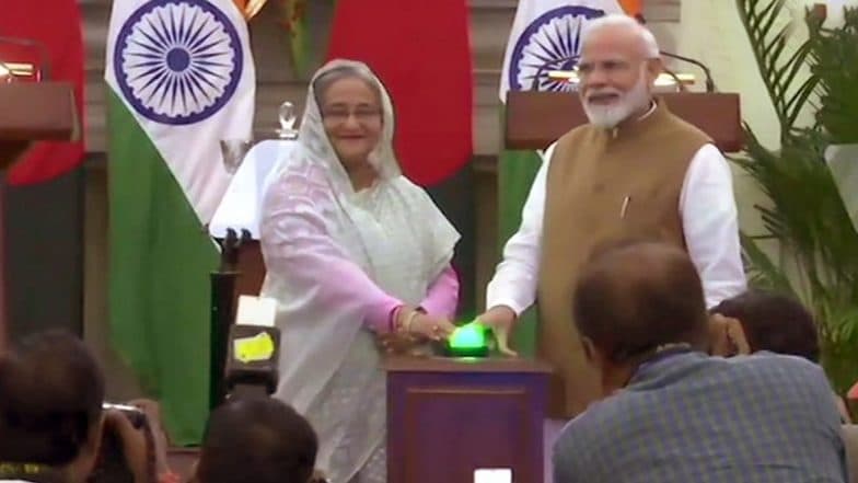 তিনটি প্রকল্পের উদ্বোধন নরেন্দ্র মোদি-শেখ হাসিনার, 'জয় বাংলা' ধ্বনি দিয়ে বার্তা প্রধানমন্ত্রীর তিনটি প্রকল্পের উদ্বোধন নরেন্দ্র মোদি-শেখ হাসিনার, 'জয় বাংলা' ধ্বনি দিয়ে বার্তা প্রধানমন্ত্রীর