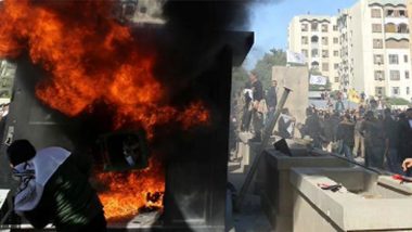 US Embassy Under Attack By Iraqi Supporters : হাশদ আশ শাবি’র সেনাঘাঁটিতে হামলার প্রতিবাদ, বাগদাদে মার্কিন দূতাবাসে আগুন ধরাল ইরাকিরা
