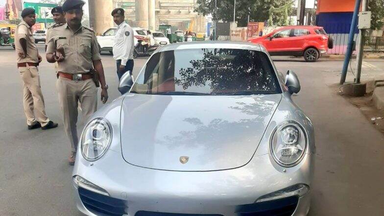 Gujarat: āĻāĻāĻ Porsche āĻāĻžāĻĄāĻŧāĻŋ āĻāĻžāĻĄāĻŧāĻžāϤ⧠āĻĒā§āϰāĻžā§ ā§¨ā§Ž āϞāĻžāĻ āĻāĻžāĻāĻž āĻāϰāĻŋāĻŽāĻžāύāĻž āĻĻāĻŋāϞā§āύ āϝā§āĻŦāĻ!