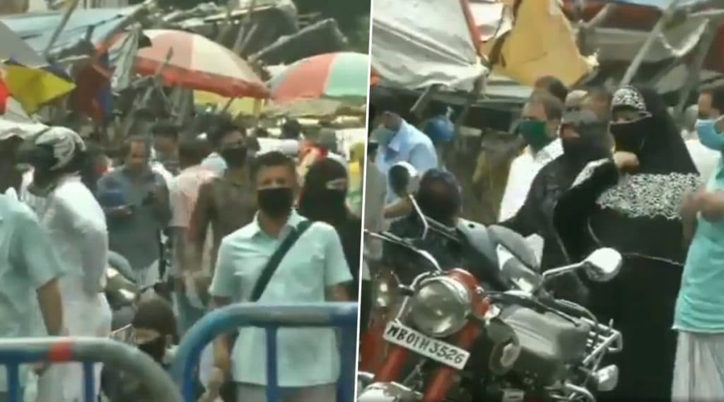 Kolkata: সোশ্যাল ডিসট্যান্সিংকে থোড়াই কেয়ার, হটস্পট রাজাবাজারে উপচে পড়ছে ভিড় Kolkata: সোশ্যাল ডিসট্যান্সিংকে থোড়াই কেয়ার, হটস্পট রাজাবাজারে উপচে পড়ছে ভিড়