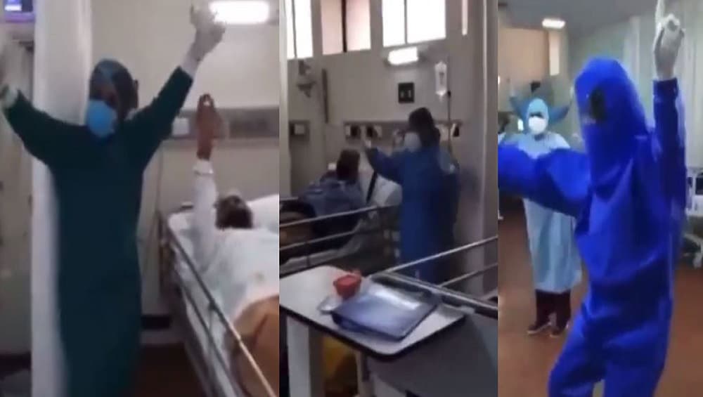 Healthcare Workers Bhangra: হার না মানার লড়াই, কোভিড রোগীদের মনের জোর বাড়াতে পিপিই-তেই ভাঙড়া চিকিৎসকদের Healthcare Workers Bhangra: হার না মানার লড়াই, কোভিড রোগীদের মনের জোর বাড়াতে পিপিই-তেই ভাঙড়া চিকিৎসকদের