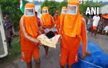 West Bengal Flood: জলে ভাসছে ঘাটাল, অন্তঃসত্ত্বা মহিলাকে উদ্ধার এনডিআরএফের