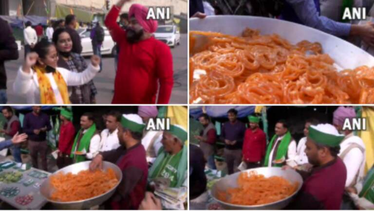 People Celebrate At Ghazipur Border:  কৃষি আইন বিলোপের আনন্দে গাজিপুর সীমান্তে জিলিপি সহযোগে উদযাপন, দেখুন ছবি