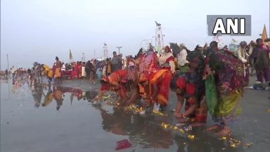 Gangasagar Mela: গঙ্গাসাগরে পূণ্যস্নান, করোনাকালে বিরামহীন 'মাস্কবিহীন' স্নান