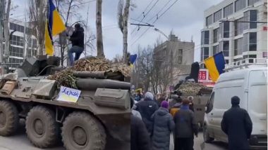 Russia-Ukraine War: ভয় সরিয়ে, রাশিয়ার ট্যাঙ্কের উপর উঠে জাতীয় পতাকা তুললেন ইউক্রেনিয়ন, ভাইরাল ভিডিয়ো