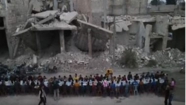 Syria: ধ্বংসস্তূপ আলেপ্পো, বিধ্বস্ত শহরে বসেই ইফতার সিরিয়ার অসহায় মানুষের