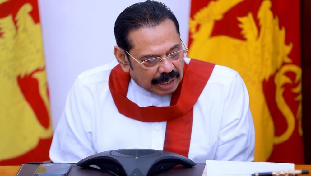 Sri Lanka: ক্ষোভে ফুঁসছে শ্রীলঙ্কা, জ্বলছে রাজাপাক্ষের বাড়ি, প্রাণ বাঁচাতে গোপণ ডেরায় প্রাক্তন প্রধানমন্ত্রী Sri Lanka: ক্ষোভে ফুঁসছে শ্রীলঙ্কা, জ্বলছে রাজাপাক্ষের বাড়ি, প্রাণ বাঁচাতে গোপণ ডেরায় প্রাক্তন প্রধানমন্ত্রী