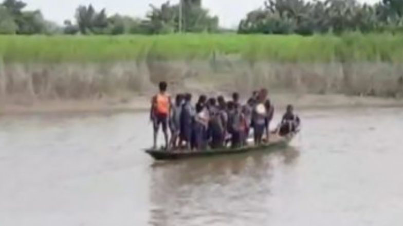 Assam: নৌকা চালিয়ে স্কুলের পথে প্রাথমিকের পড়ুয়ার দল (ভাইরাল ভিডিও)