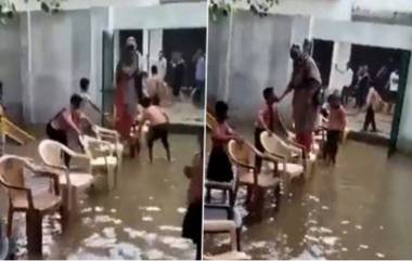 Viral Video: পড়ুয়াদের পেতে দেওয়া চেয়ারে পা দিয়ে জলমগ্ন ক্লাসঘর পেরিয়ে গেলেন শিক্ষিকা, ভাইরাল ভিডিও