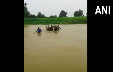 Madhya Pradesh: অন্তঃসত্ত্বাকে কাধে নিয়ে নদী পার করলেন গ্রামের মানুষ, দেখুন ভিডিয়ো