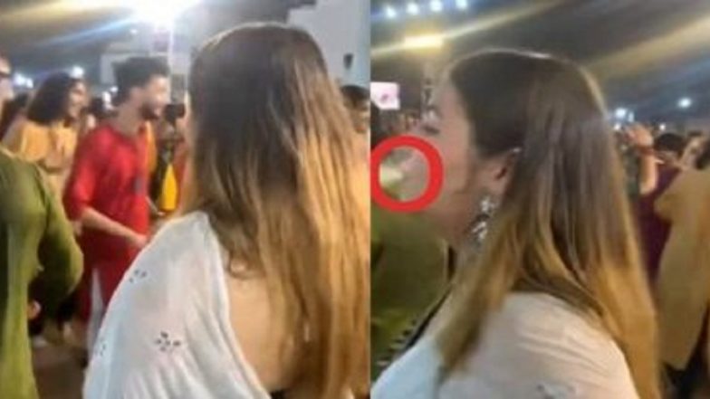 Viral Video: গরবার সময় ই-সিগারেটে টান, ধর্মীয় বিশ্বাসে আঘাতের অভিযোগে মহিলার উপর নজরদারি পুলিশের