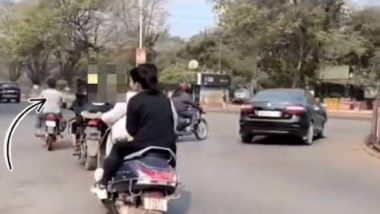 Viral Video: চলন্ত বাইকে রোম্যান্সে মত্ত যুগল, ভিডিয়ো ভাইরাল হতেই গ্রেফতার 