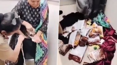 Video: মহিলার পোশাক থেকে বেরোচ্ছে একের পর এক জিনিস, দেখুন ভিডিয়ো