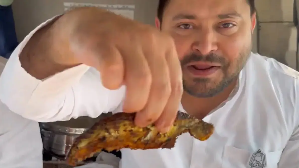 Tejashwi Yadav: প্রচারের মাঝে মাছ খাওয়া নিয়ে বিতর্ক! ধর্ম নিয়েই রাজনীতি করতে ব্যস্ত বিজেপি, পাল্টা দাবি তেজস্বীর