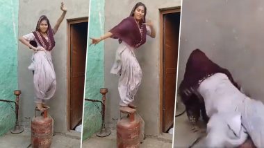 Viral Video: রিল বানানোর জন্য সিলিন্ডারের উপরে উঠে নাচ, ভারসাম্য হারিয়ে উল্টে গেল মেয়েটি, ভাইরাল ভিডিও